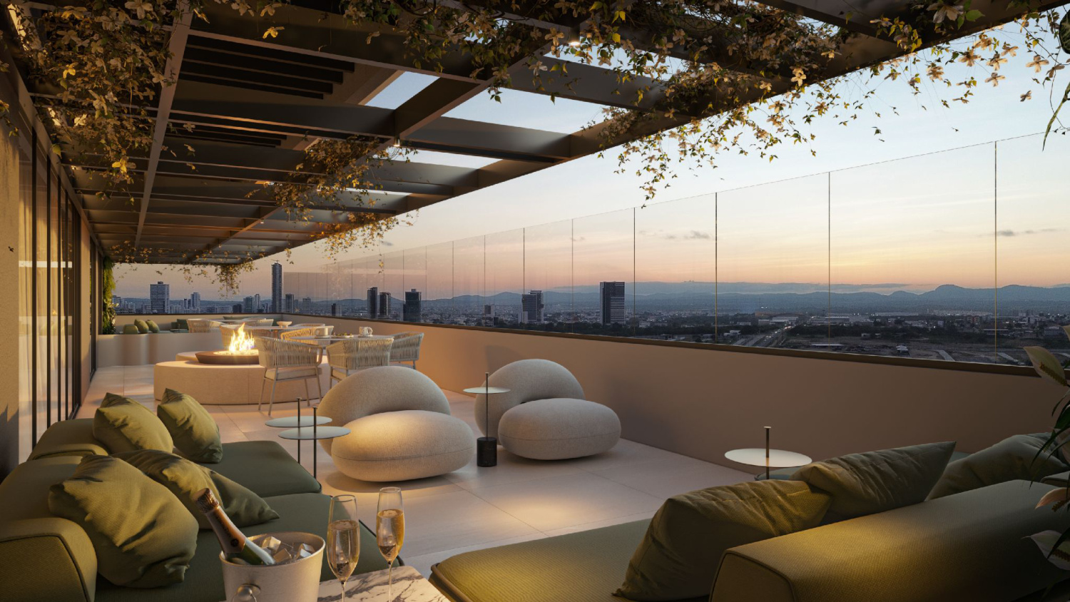 Lounge do rooftop do Versatto Residencial ao entardecer
